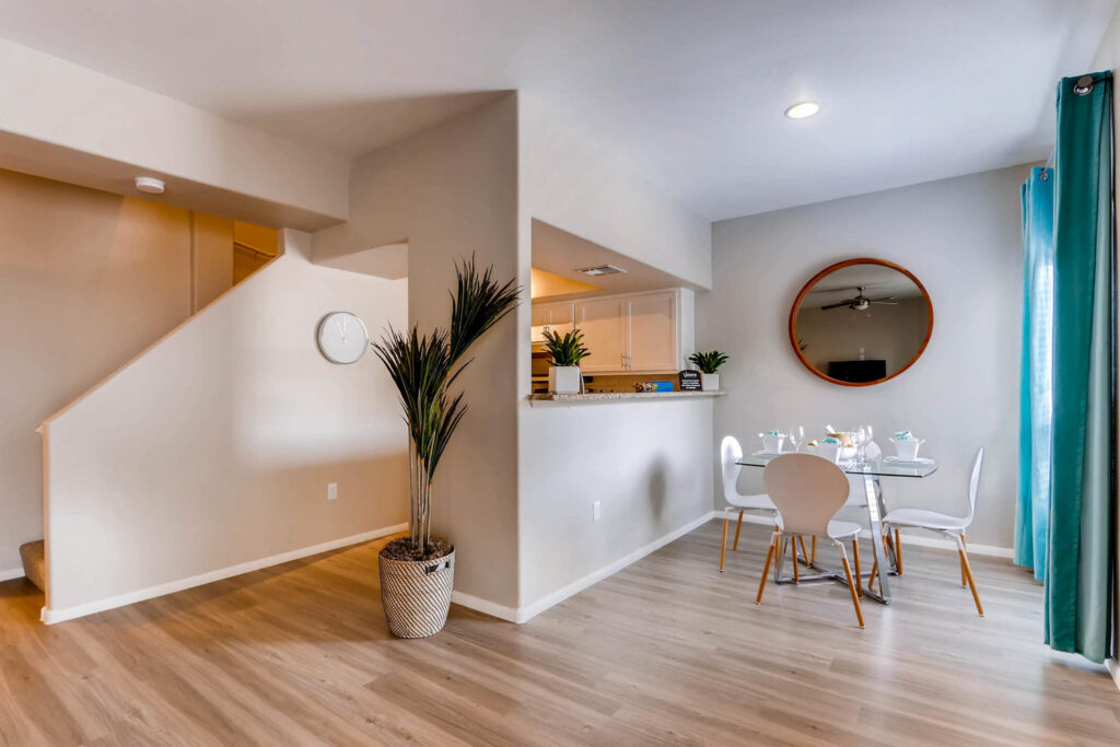Dining area with view of kitchen and stairs