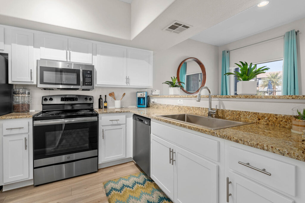 Spacious kitchen with a dishwasher at Verano apartment homes in Phoenix.