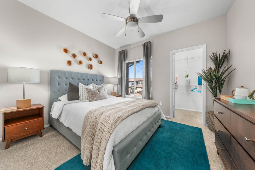 Bedroom with large window at Verano Townhomes in Phoenix.